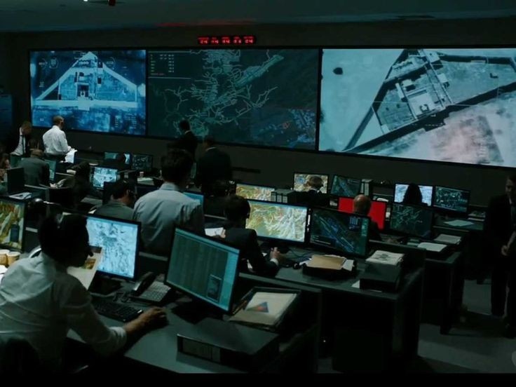 A local government planning official reviewing a GIS map of community service 
coverage on a computer or large screen display